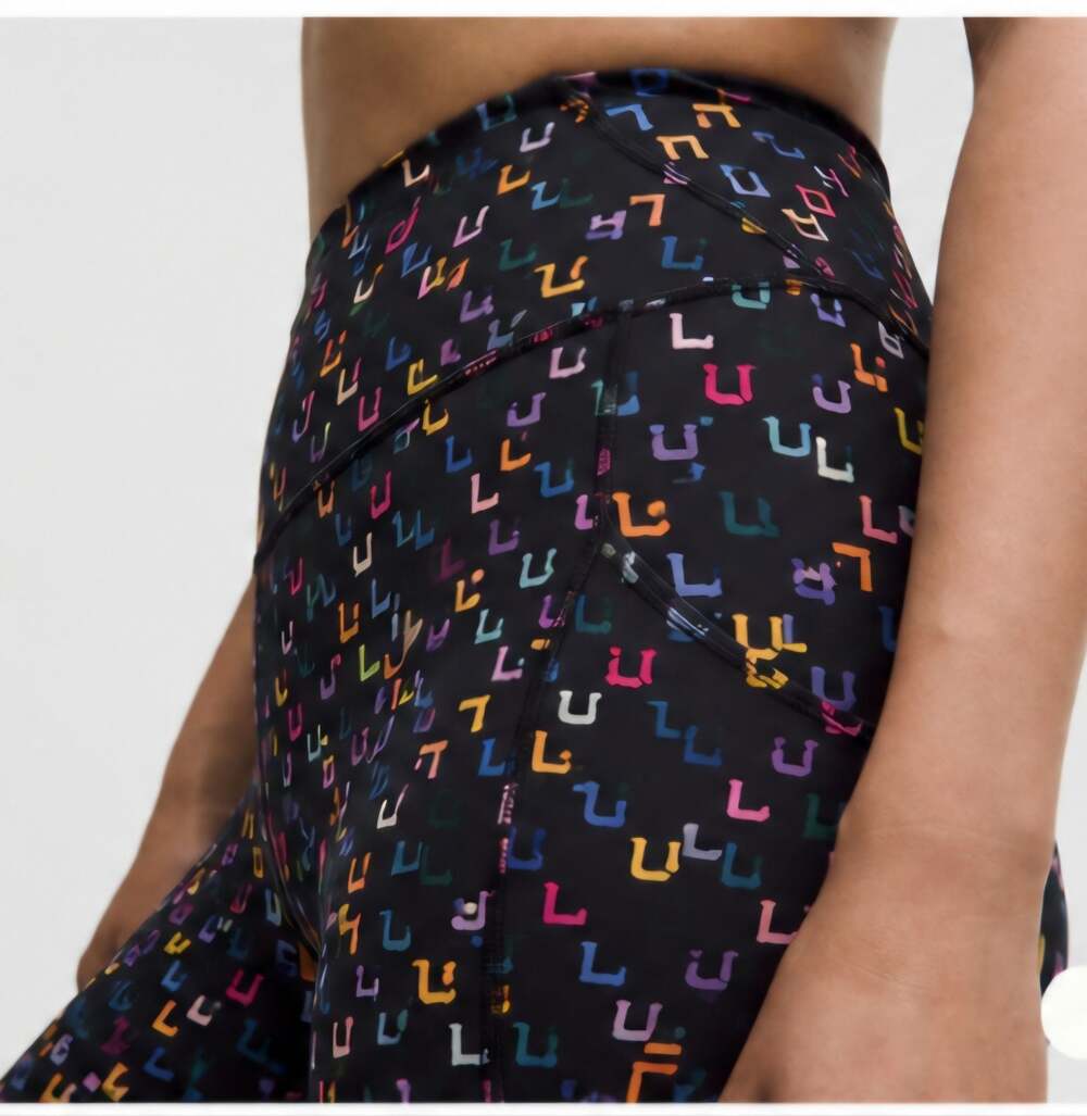 Lululemon Fast and Free High-Rise Tight 25" with Pockets in Multicolor Logo Prin